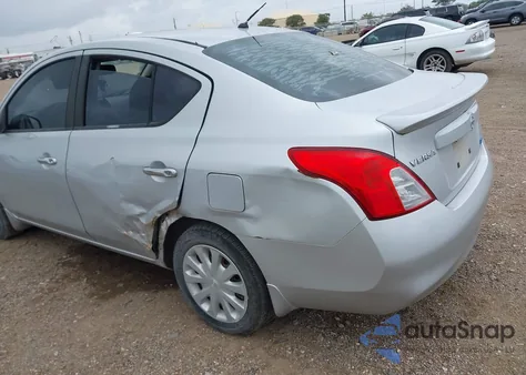 2012 Nissan Versa 1.6 Sv z USA, uszkodzony, nr VIN 3N1CN7AP9CL853199